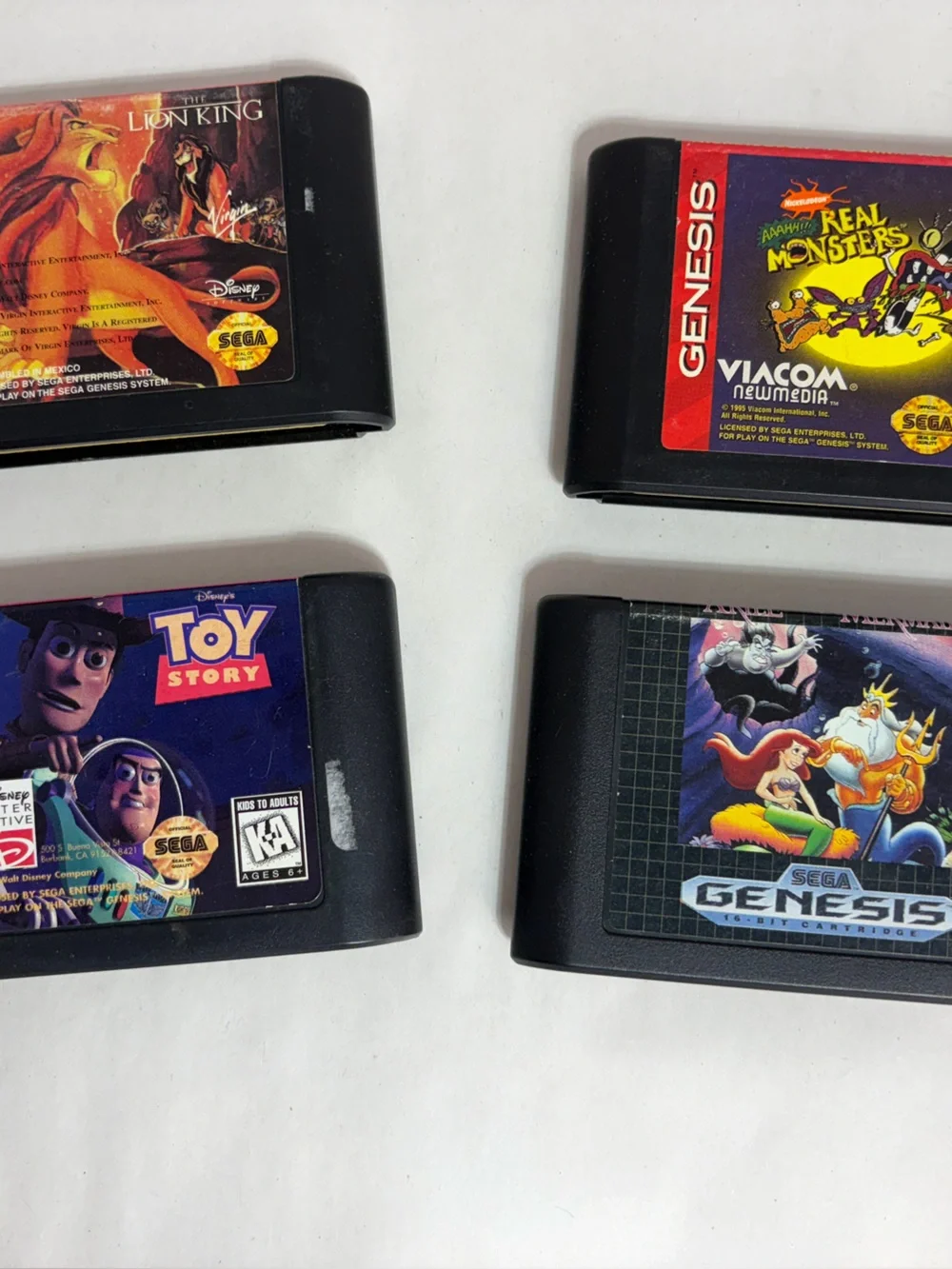 Lot Of 4 Sega Genesis Kids Games Lion King, Toy Story, Little Mermaid, Monsters